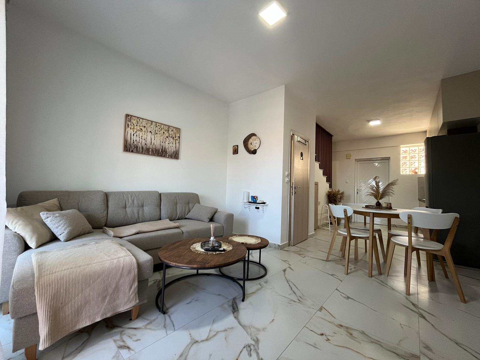 Aegean Dream living room sofa and dining area